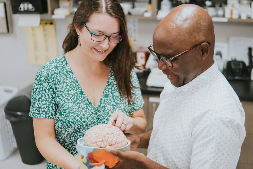 Dr. Rebecca Dielschneider and Dr. Morgan Mulenga.