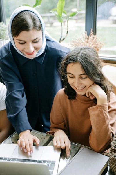 A mentor guiding a student through mentorship